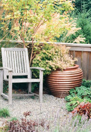 chair and planter in garden